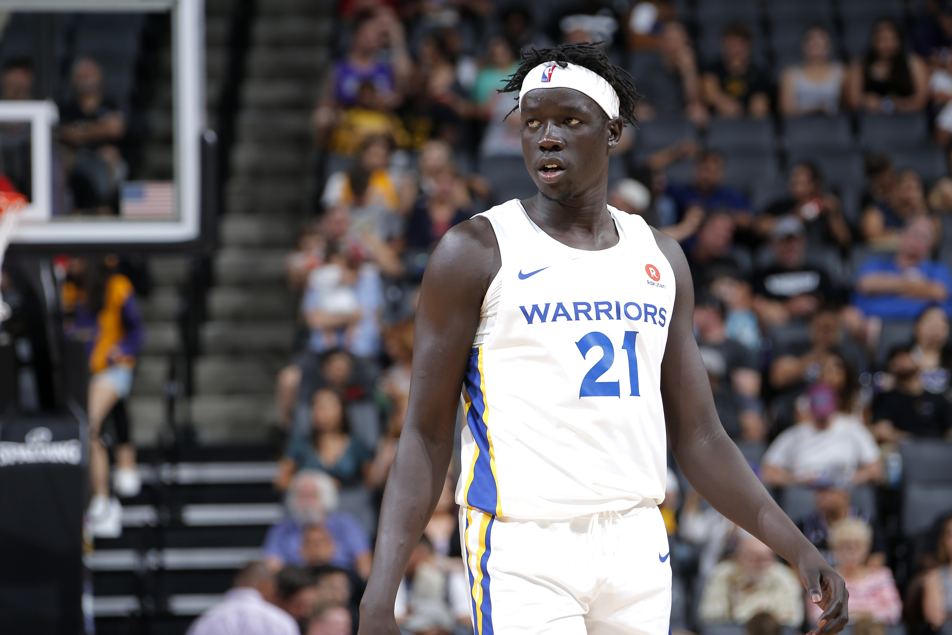 SACRAMENTO, CA - JULY 5: Nuni Omot #21 of the Golden State Warriors looks on during the gam against the Los Angeles Lakers during the 2018 Summer League at the Golden 1 Center on July 5, 2018 in Sacramento, California. NOTE TO USER: User expressly acknowledges and agrees that, by downloading and or using this photograph, User is consenting to the terms and conditions of the Getty Images License Agreement. Mandatory Copyright Notice: Copyright 2018 NBAE (Photo by Rocky Widner/NBAE via Getty Images)